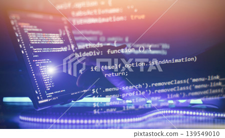 Conceptual software development. Programmer hand with stylus on touchscreen and abstract glowing coding overlay in neon light. Conceptual software development. Programmer hand with stylus on touchscreen and abstract glowing coding overlay in neon light. 139549010