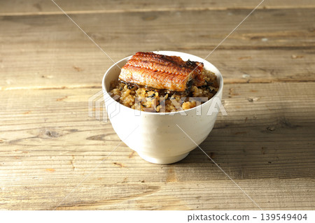 A single photo of a mini eel rice bowl. A single photo of a mini eel rice bowl. 139549404