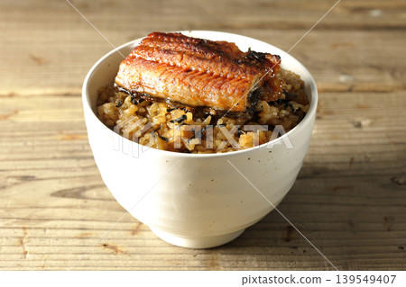 A single photo of a mini eel rice bowl. A single photo of a mini eel rice bowl. 139549407