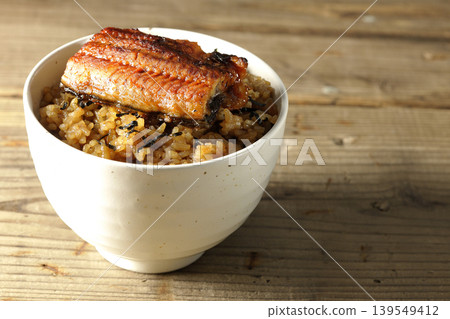 A single photo of a mini eel rice bowl. A single photo of a mini eel rice bowl. 139549412