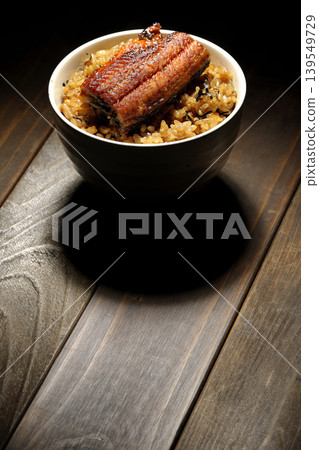 A single photo of a mini eel rice bowl. A single photo of a mini eel rice bowl. 139549729
