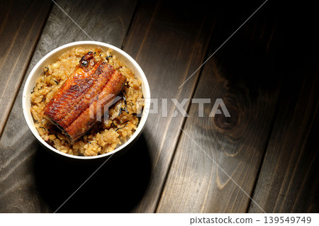 A single photo of a mini eel rice bowl. A single photo of a mini eel rice bowl. 139549749