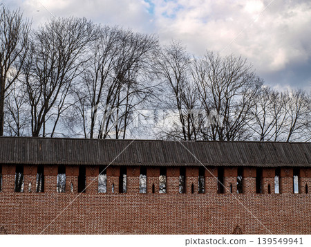 Ancient brick fortress wall and tower battlements in Smolensk Historic Russian defensive architecture Ancient brick fortress wall and tower battlements in Smolensk Historic Russian defensive architecture 139549941