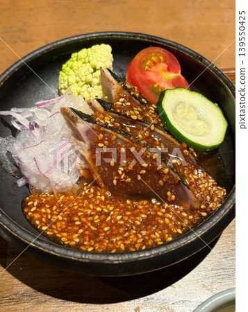 Seared bonito topped with sesame sauce Seared bonito topped with sesame sauce 139550425
