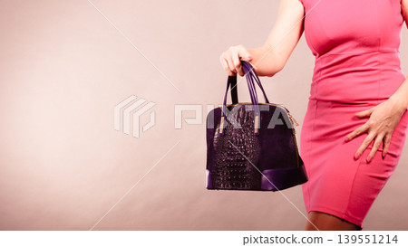 Elegant woman buyer with black bag. Elegant woman buyer with black bag. 139551214