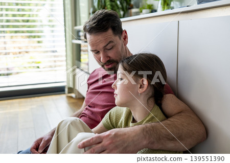 Parent providing mental health support to teenage child facing challenges at home. 139551390