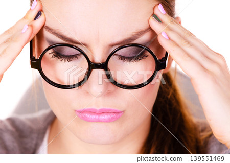 Woman suffering from headache migraine pain 139551469