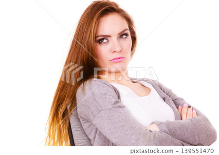 Woman tired serious offended face expression Woman tired serious offended face expression 139551470