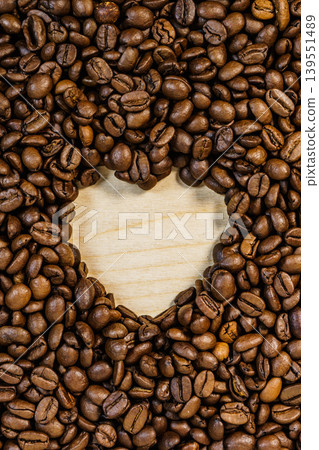 Roasted coffee beans with heart form Roasted coffee beans with heart form 139551489