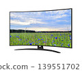 Curved screen smart tv with blue cornflowers field on screen 139551702