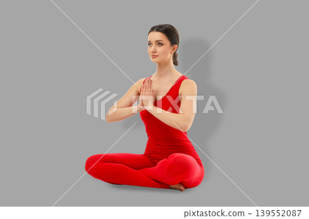 Yoga session with person in red seated Yoga session with person in red seated 139552087