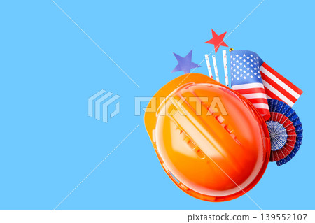 Hard hat rests among patriotic decorations celebrating Labor Day Hard hat rests among patriotic decorations celebrating Labor Day 139552107