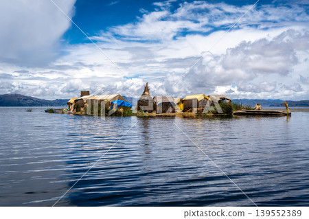 Floating island "Uros Titino" on Lake Titicaca in Peru Floating island "Uros Titino" on Lake Titicaca in Peru 139552389