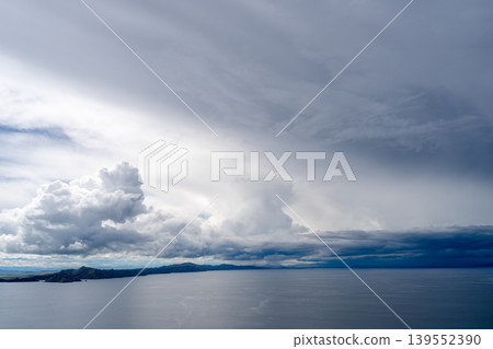 View of Lake Titicaca from Amantani Island under stormy clouds View of Lake Titicaca from Amantani Island under stormy clouds 139552390