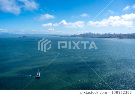San Francisco skyline and bay with boats view from Golden Gate Bridge San Francisco skyline and bay with boats view from Golden Gate Bridge 139552392