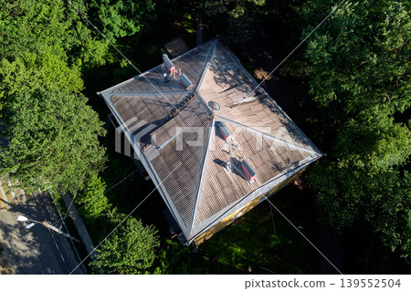 Roof of a residential apartment building covered with slate, aerial view 139552504