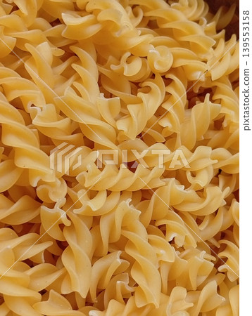 Close-up of spiral-shaped Italian pasta Close-up of spiral-shaped Italian pasta 139553158
