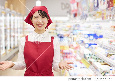 Young woman working at a supermarket Young woman working at a supermarket 139553262