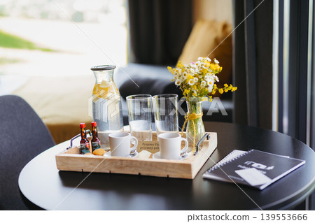 Welcome refreshment prepared in modern tiny house accommodation. Welcome refreshment prepared in modern tiny house accommodation. 139553666