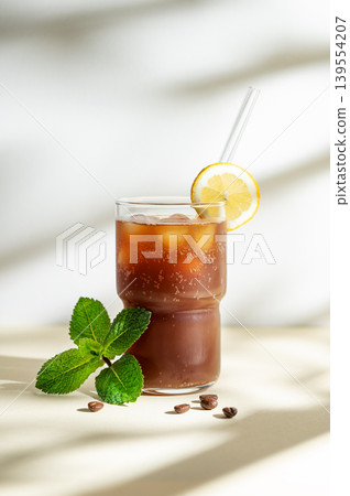 Cold Coffee Tonic Drink With Lemon and Ice Cold Coffee Tonic Drink With Lemon and Ice 139554207