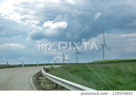 Wind turbine in nature with day light Wind turbine in nature with day light 139554691