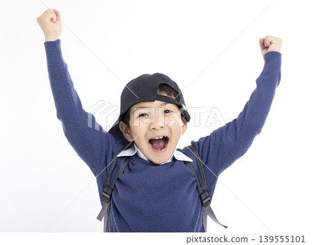Excited Little boy wearing baseball cap isolated on white Excited Little boy wearing baseball cap isolated on white 139555101