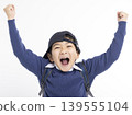 Excited Little boy wearing baseball cap isolated on white 139555104
