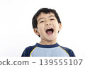 Closeup Excited and Happy Little boy face isolated on white 139555107