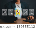 Business professional interacting with digital interface showcasing quality assurance and document management icons. 139555112