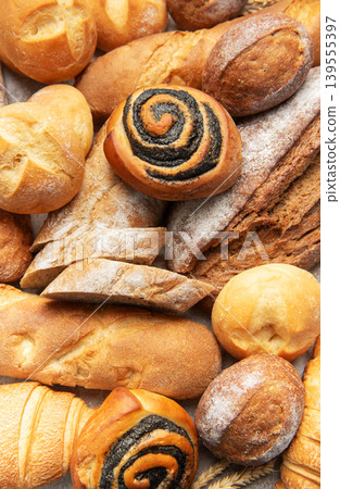 Assortment of fresh baked bread rolls and pastries Assortment of fresh baked bread rolls and pastries 139555397