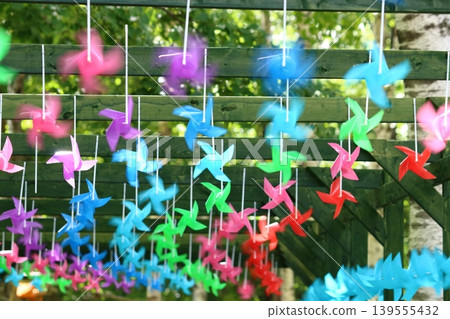 Many colorful windmills Many colorful windmills 139555432
