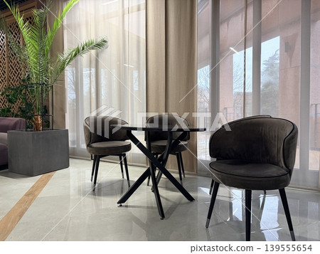 Modern lounge or waiting area designed with a minimalist aesthetic. Clean, contemporary design Modern lounge or waiting area designed with a minimalist aesthetic. Clean, contemporary design 139555654