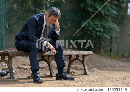 depressed businessman depressed businessman 139555849