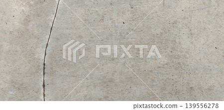 Grey concrete surface texture with aesthetic natural cracks. 139556278