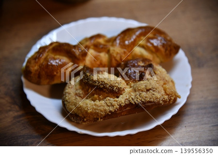 premium food photography of fresh bakery products on marble table, soft daylight, clean background 139556350