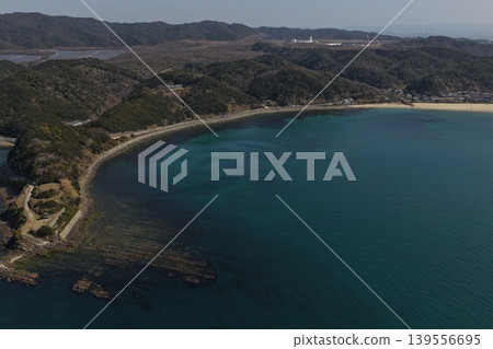 An aerial photograph showing a curved inlet in Kada, Wakayama Prefecture, viewed from an oblique angle. An aerial photograph showing a curved inlet in Kada, Wakayama Prefecture, viewed from an oblique angle. 139556695