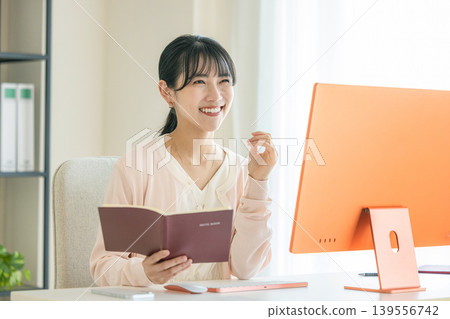 Female office worker Female office worker 139556742