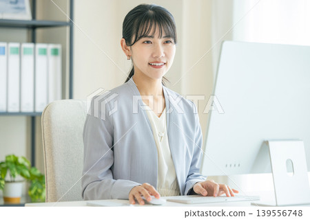 Business woman heading to PC Business woman heading to PC 139556748