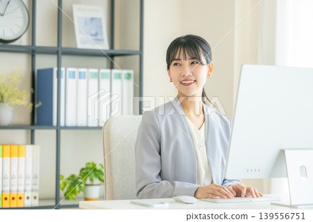 Business woman heading to PC Business woman heading to PC 139556751