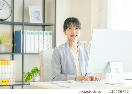 Business woman heading to PC Business woman heading to PC 139556752