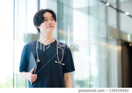 A medical image that evokes a sense of security and trust, like a university hospital with clean windows and smiling medical professionals (doctors and nurses). A medical image that evokes a sense of security and trust, like a university hospital with clean windows and smiling medical professionals (doctors and nurses). 139556992