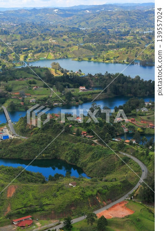 The breathtaking scenery and emerald green waters of Lake Guatapé, a hidden gem in Colombia, South America. The breathtaking scenery and emerald green waters of Lake Guatapé, a hidden gem in Colombia, South America. 139557024