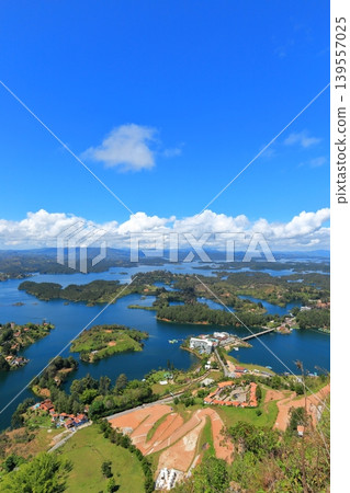 The breathtaking scenery and emerald green waters of Lake Guatapé, a hidden gem in Colombia, South America. The breathtaking scenery and emerald green waters of Lake Guatapé, a hidden gem in Colombia, South America. 139557025