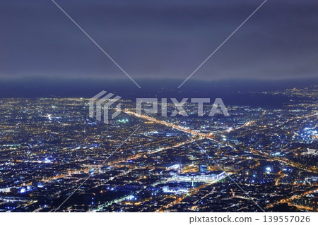 A panoramic night view of Bogotá city: The glittering city lights and intersections of the Colombian capital. A panoramic night view of Bogotá city: The glittering city lights and intersections of the Colombian capital. 139557026