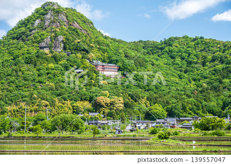 View of Mt. Akagami (Mt. Tarobo) from the rice fields of the Omi Plain, Higashiomi City, Shiga Prefecture 139557047