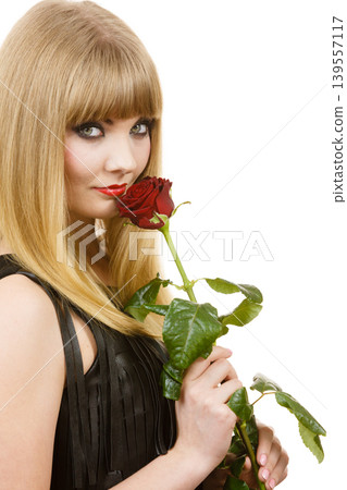Beautiful young lady with red rose. Beautiful young lady with red rose. 139557117