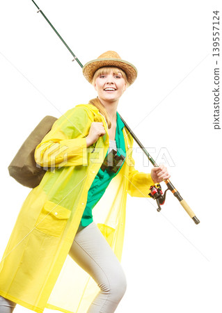 Woman with fishing rod, spinning equipment 139557124