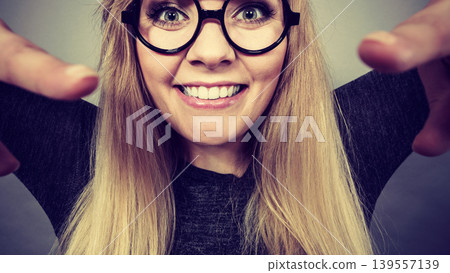 Closeup woman happy face with eyeglasses Closeup woman happy face with eyeglasses 139557139