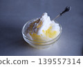 Shaved ice served in a glass bowl 139557314