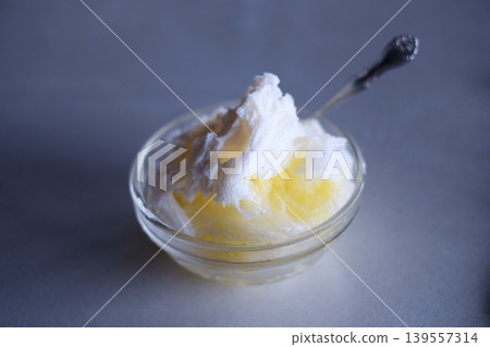 Shaved ice served in a glass bowl 139557314